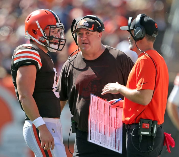 Cleveland Browns quarterback Baker Mayfield (6) meets with Cleveland Browns offensive coordinator Alex Van Pelt, center, and Cleveland Browns head coach Kevin Stefanski during the first half of an NFL football game against the Houston Texans, Sunday, Sept. 19, 2021, in Cleveland, Ohio. [Jeff Lange/Beacon Journal] Browns 10